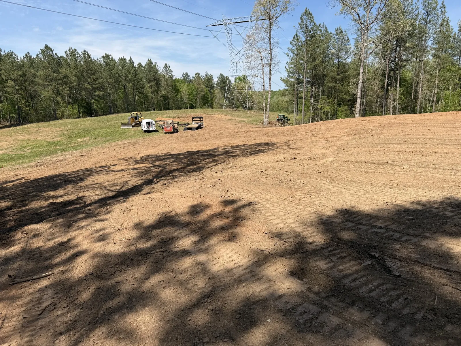 Overgrown field cut back to open ground with our machines on site in Cleveland County, NC